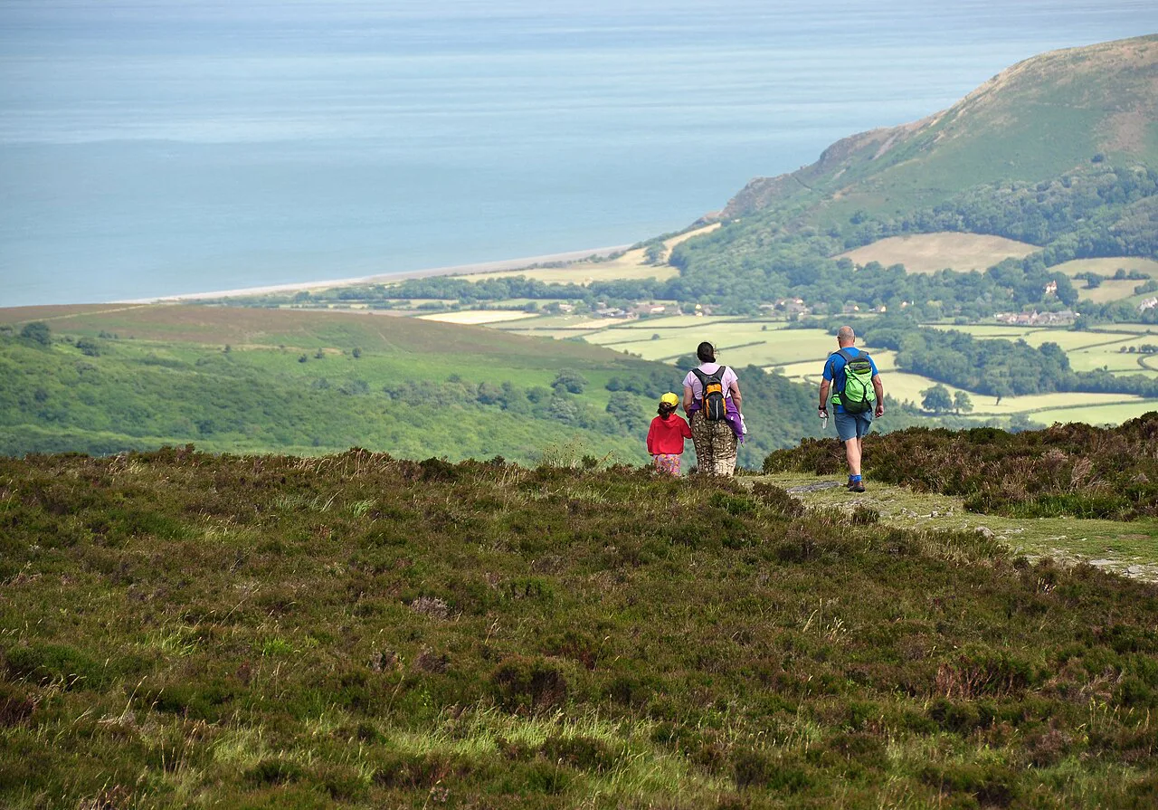 Hikers and Porlock Bay, Europe