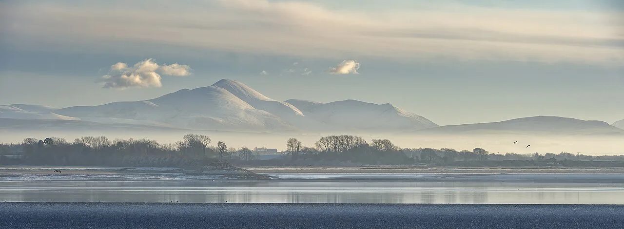 Snowy Skiddaw from Solway Firth, Lake District